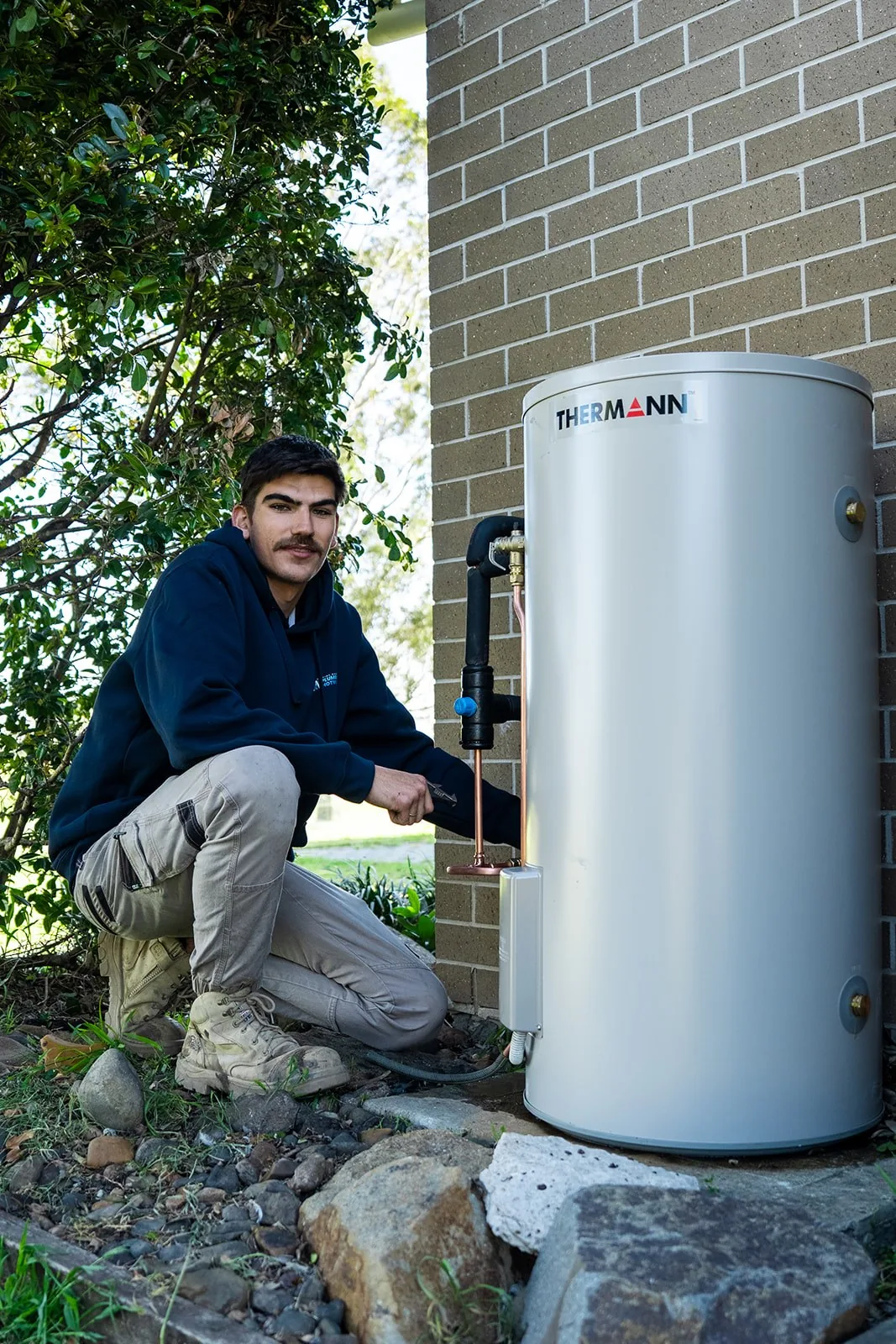 On Time plumber installing a Thermann storage hot water system